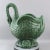 An extraordinary and highly important exhibition-sized Weller Pottery swan planter jardiniere. This rare monumental piece...