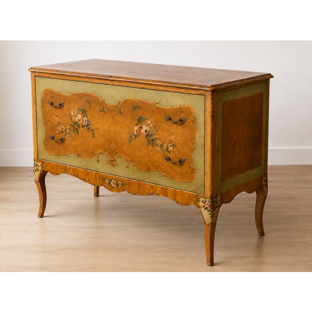 An absolutely enchanting vintage French Provincial bombe chest featuring beautifully hand-painted floral decoration,...