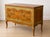 An absolutely enchanting vintage French Provincial bombe chest featuring beautifully hand-painted floral decoration,...
