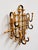 Bring timeless European charm to your entryway, mudroom, bedroom, or bath with this vintage burnt bamboo wall coat rack....