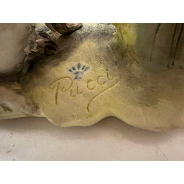 Renowned for its exquisite artistry and craftsmanship in Naples, Italy. This figurine of hunters with their guns and dog...