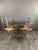Table and Chair Set from the “Villa d’Este” Collection by Pierre Vandel, 1970s Discover this captivating table and chair...