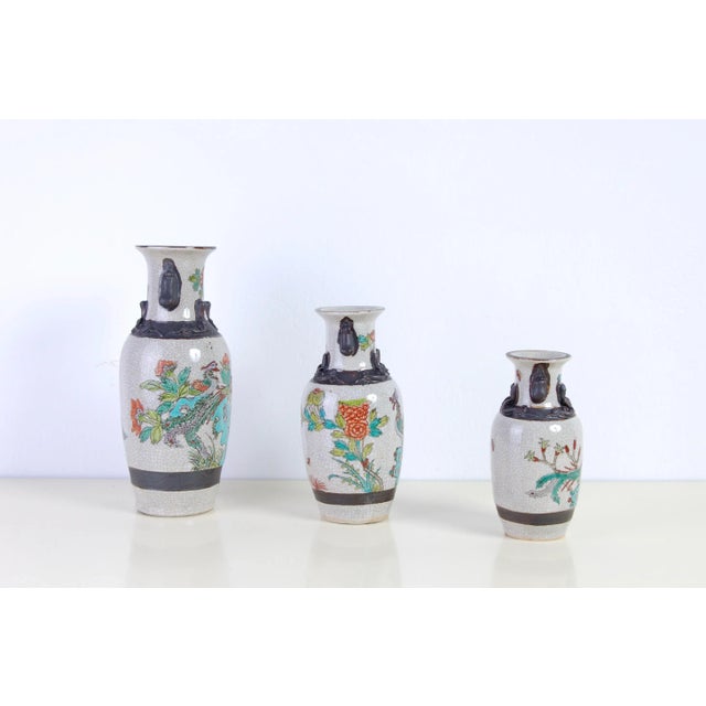 Interesting set of Japanese vases made of glazed ceramic, with crackle effect. Colorful decoration with rooster subject....
