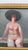 Signed figurative female nude portrait dated 1997, depicting a seated woman wearing a dramatic black wide-brimmed hat....