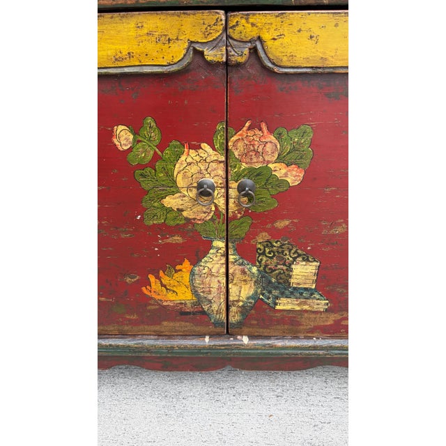 The color of this sideboard / credenza sold me. It is vibrant and beautiful and gives a very Bohemian Folk art vibe. The...