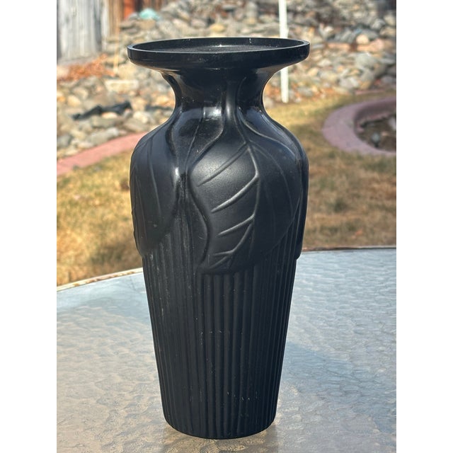 Tiffin Black Glass Art Deco Vase with Embossed Leaves and ribbed bottom. Tiffin was an elegant glass maker in the...