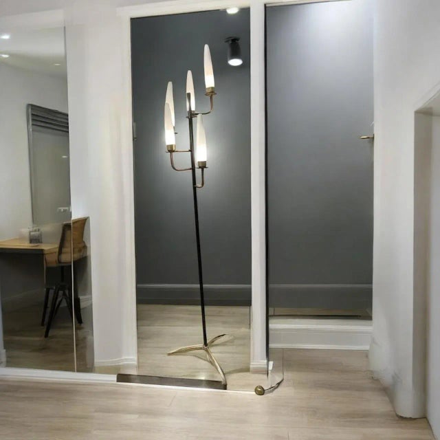 1950s Brass & Opaline Glass Floor Lamp This elegant floor lamp from the 1950s blends sculptural form with refined...