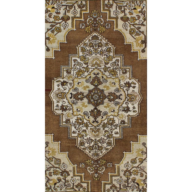 Measures: 6'4 x 9'11. Vintage Turkish Oushak Rug in Warm Brown, Ivory, and Golden Yellow Tones. Keivan Woven Arts / rug...