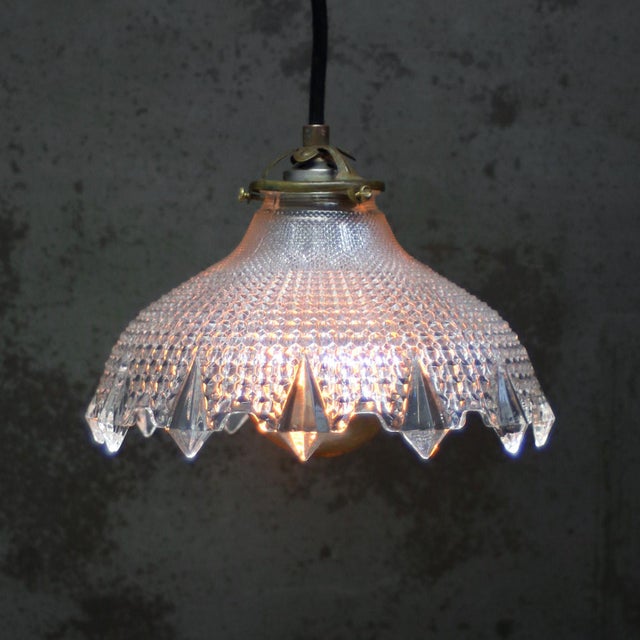 Vintage brass and glass pendant by holophane, france brass top with cut glass shade e27 / e26 this piece has an...