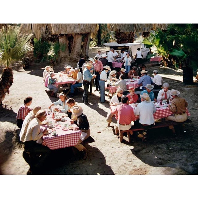 Lunch Al Fresco 1970 by Slim Aarons Slim Aarons Limited Estate Edition A group of horse riders stop for lunch among...