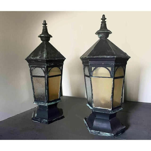 Antique pair of heavy-gauge copper exterior post lanterns of impressive scale. This fine pair of lanterns has a hexagonal...
