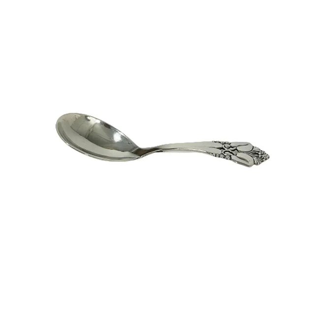 Small Danish Silver Johannes Siggaard sugar /tea caddy spoon, 1947 A Silver spoon with floral final, marked with the...