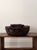 A mid-20th century hand-woven rattan basket from southern China — most likely Guangdong or Fujian province, where...