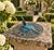 A classic vintage iron verdigris garden sundial inspired by traditional English estate landscapes, reading "Grow old along...