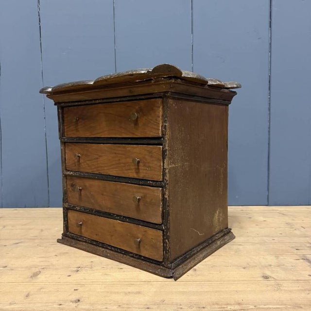 Beautiful antique painted wooden chest of drawers from the Netherlands, 19th century. The chest features four identical...