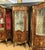 Make a statement with this grand French Louis XV-style display cabinet, crafted from solid, heavy wood and richly...