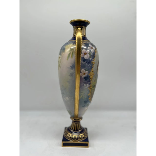 An antique Victorian painted Royal Bonn vase by Franz Anton Mehlem, made in Bonn, Germany. Features an elegant painted...