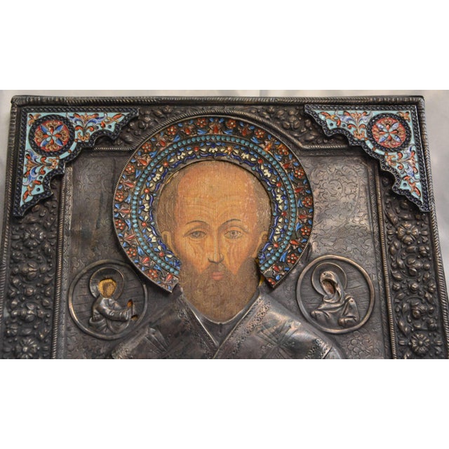 We are offering a Late 19th century Russian icon oil painting on panel with an .875 silver riza. The painting depicts St....