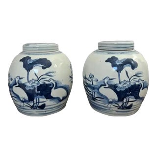 Pair of Mid 20th Century Blue and White Ginger Jars With Coastal Depictions of Cranes, Water and Shore Grass For Sale