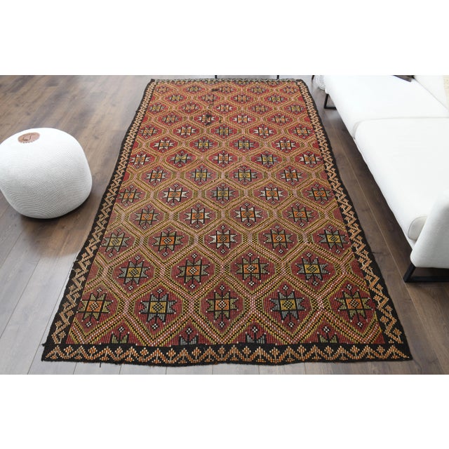 Vintage Turkish Hand-Knotted vintage rug is a semi-antique vintage area rug.'70s Eastern region of Turkey's unique rug is...