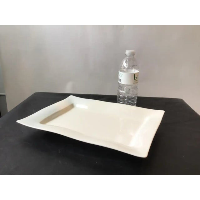 Spin ceramics serving plate. New.