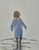 This artwork captures the serene innocence of childhood with a striking composition. A lone figure of a young child,...