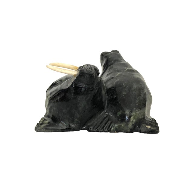 Inuit Walrus Pair Hand Carved Folk Art Serpentine Signed William Luke This hand-carved walrus pair on one piece of...