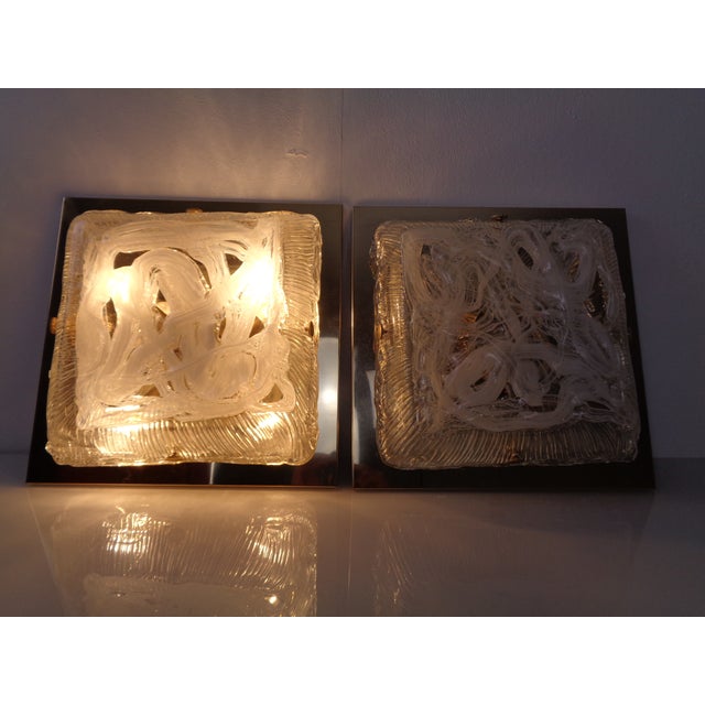 Large ceiling light in hand-blown Murano glass & brass from the 1970s. Marked with label. Two identical lights are...