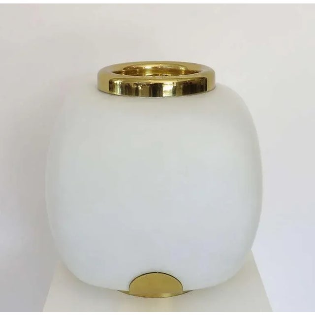 Italian opaque glass and brass pique fleur table lamp by Arredoluce Interior 23 bulb light gives a soft glow and the liner...