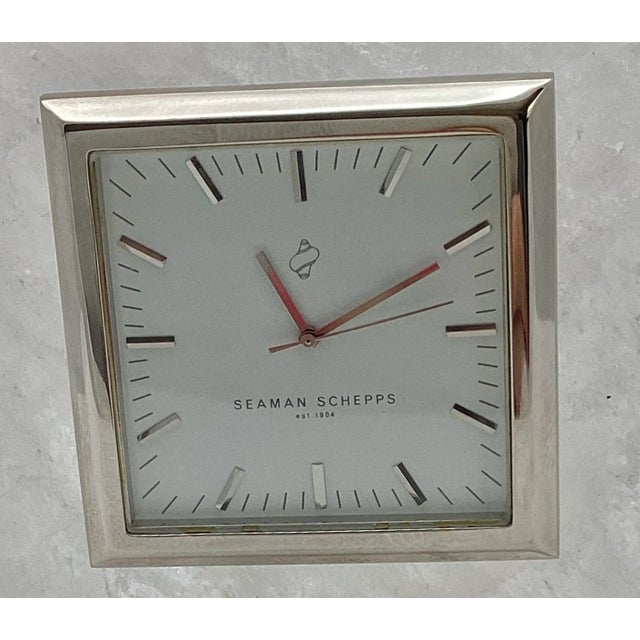A beautiful Vintage Rock Crystal Table Clock by Seaman Schepps in the Art Deco Style. Silver tone frame and numerals. In...