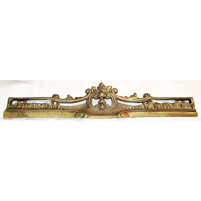 How about a solid bronze and 23k gold plated 19c French rococo fireplace andiron spreader to use as a sur-la-porte, over...