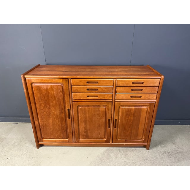 Mid-Century Scandinavian Sideboard attributed to Dyrlund, 1960s, in Very Good conditions. Designed 1960 to 1969 This piece...