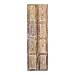 Pair of Whitewash Carved Barn Pantry Interior Bifold Doors For Sale