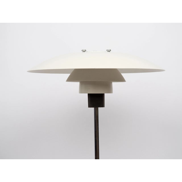 The ph 4/3 lamp is an absolute classic, designed by the renowned danish designer and architect poul henningsen. It has...