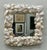 Pretty white “pearly” shell frame mirror for your powder room.