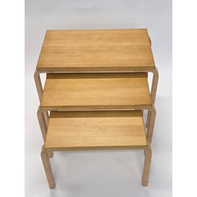 Artek 88 nesting table, ash table tops and birch legs. Gorgeous ash patterns on the edges of the table tops. In very good...