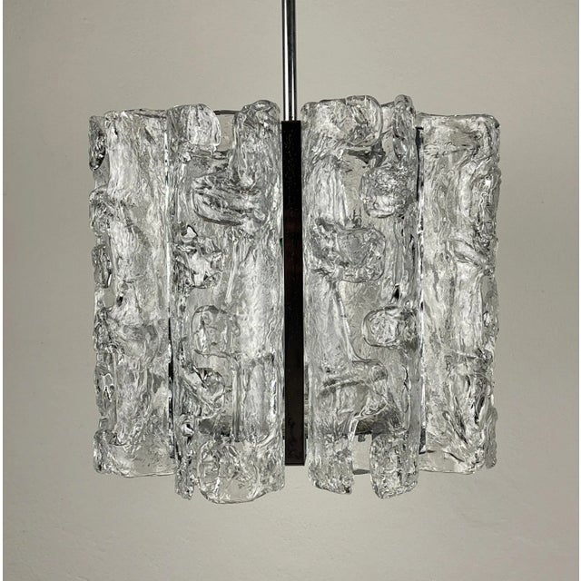Gorgeous very rare ice murano glass chandelier by av mazzega made in italy in the 1970s. the glass parts are made of...