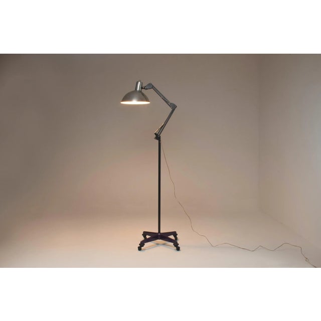 A super stylish 20th mid-century industrial French doctor's floor lamp of robust design. It is composed of a steel...