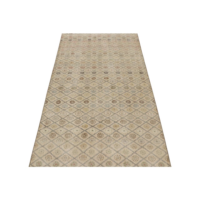 This vintage 6x11 rug is a new, rare addition to Rug & Kilim’s Mid-Century Pasha Collection. This line is a commemoration,...