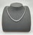 This exquisite natural diamond necklace features a stunning array of 125 round white diamonds, exuding a modern elegance....