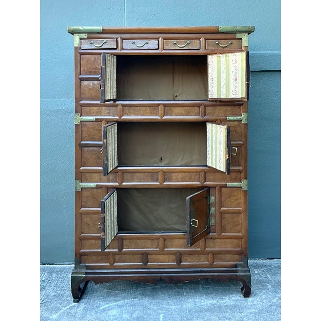 This magnificent Korean traditional "Icheungjang" or chest on chest is a masterclass in East Asian craftsmanship,...