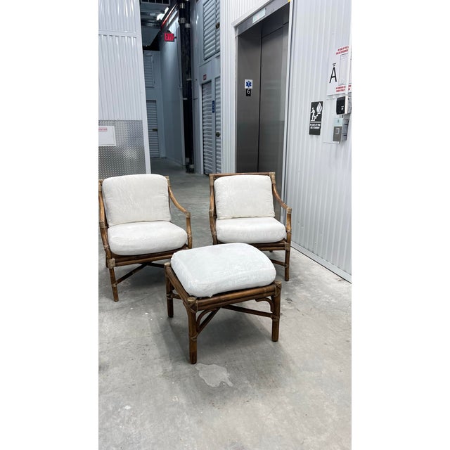 A timeless blend of craftsmanship and comfort, this pair of McGuire lounge chairs showcases their signature rattan...