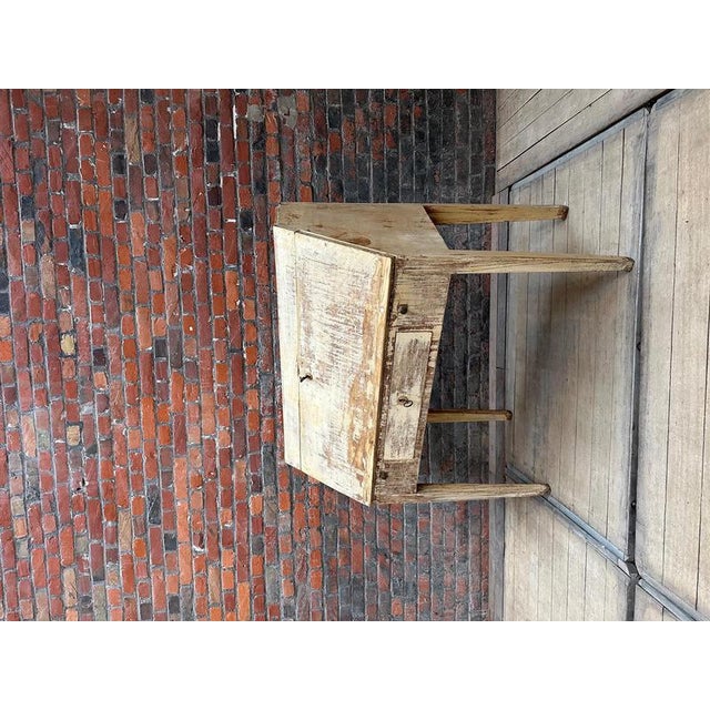 This 19th-century bureau with a curved back has been fully restored. It features a large writing surface that opens onto a...