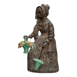 1940s Victorian Bradley and Hubbard Woman With Flowers Door Stop