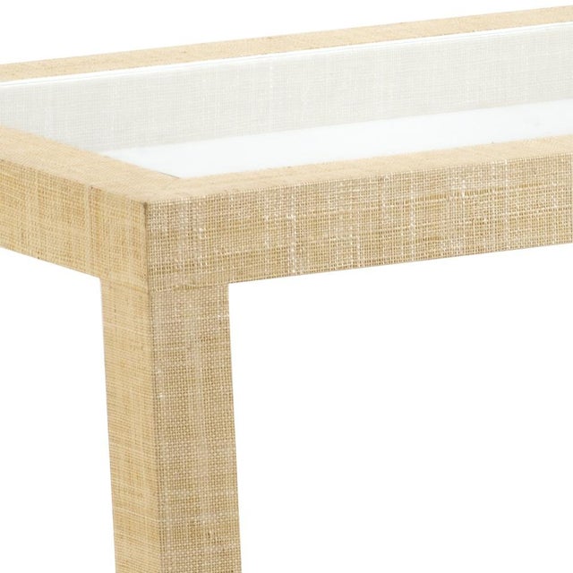 Create a coastal feel in your decor with our gaston side table. This natural woven raffia table blends easily with your...