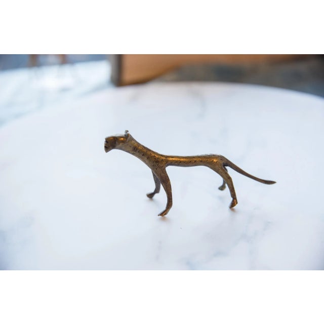 :: Vintage handmade African bronze cheetah. Circa mid 20th century and possibly older, this piece has such incredible...