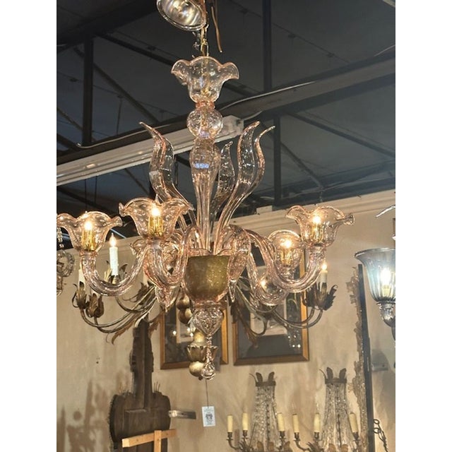 Modern Murano pink bubble glass chandelier. Circa 2000. The chandelier has been professionally rewired, comes with...
