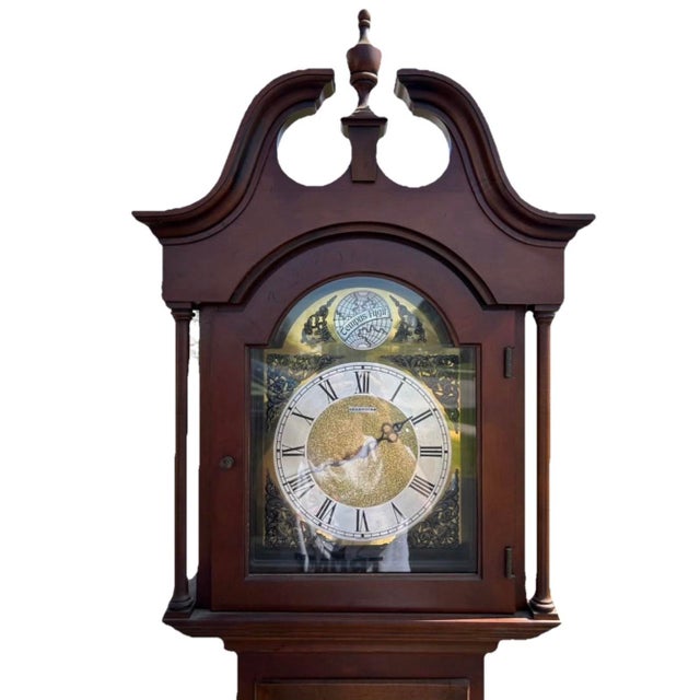 There’s something about a grandfather clock that changes the energy of a room. This Barwick by Howard Miller tall case...