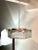 Chromed steel, art glass and Lucite Postmodern pendant fixtureby Fredrick Ramond. Neo-Deco, inspired by the streamline...