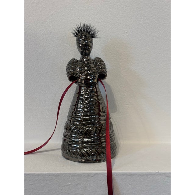 Jeremy Plotkin Wong Sisters with Ribbon 2026 Wong approaches the body through ceramics, beginning with the vessel and...